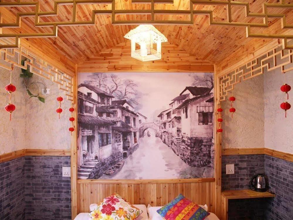 Full House Theme Hotel Wuzhen Jiaxing Dış mekan fotoğraf